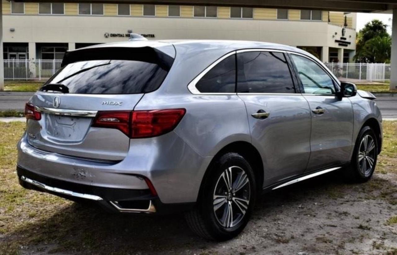 Photo 4 from auction – 2017 ACURA MDX with VIN 5FRYD3H33HB008077