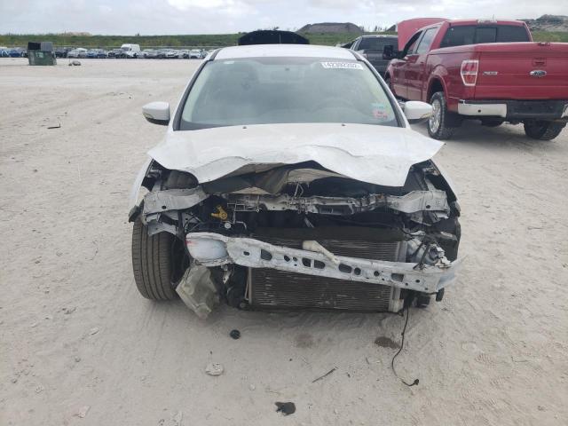 Photo 9 from auction – 2013 FORD FOCUS SE with VIN 1FADP3F25DL349463
