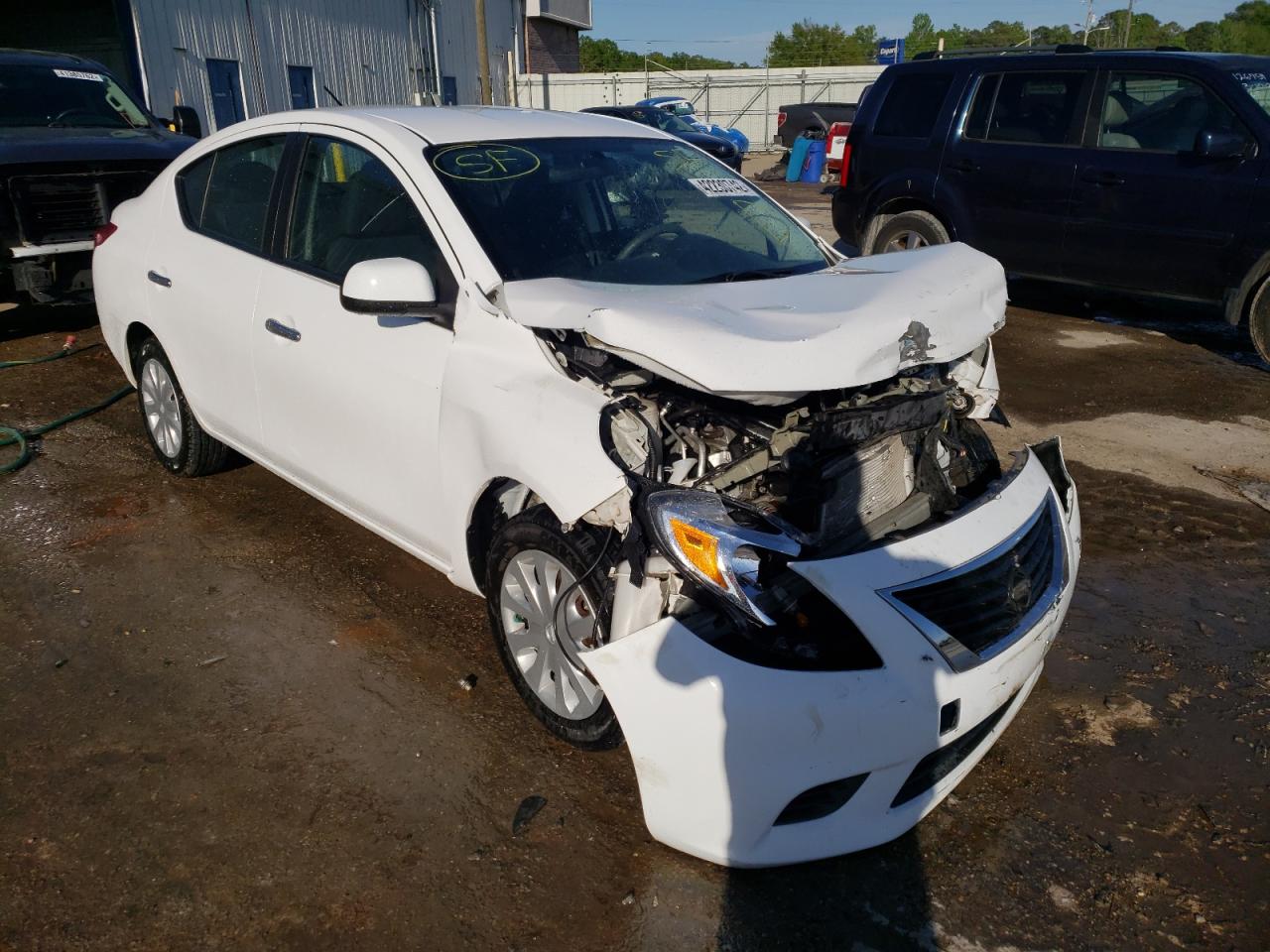 NISSAN VERSA S 2012 with VIN 3N1CN7AP1CL822450 - Photo from auction