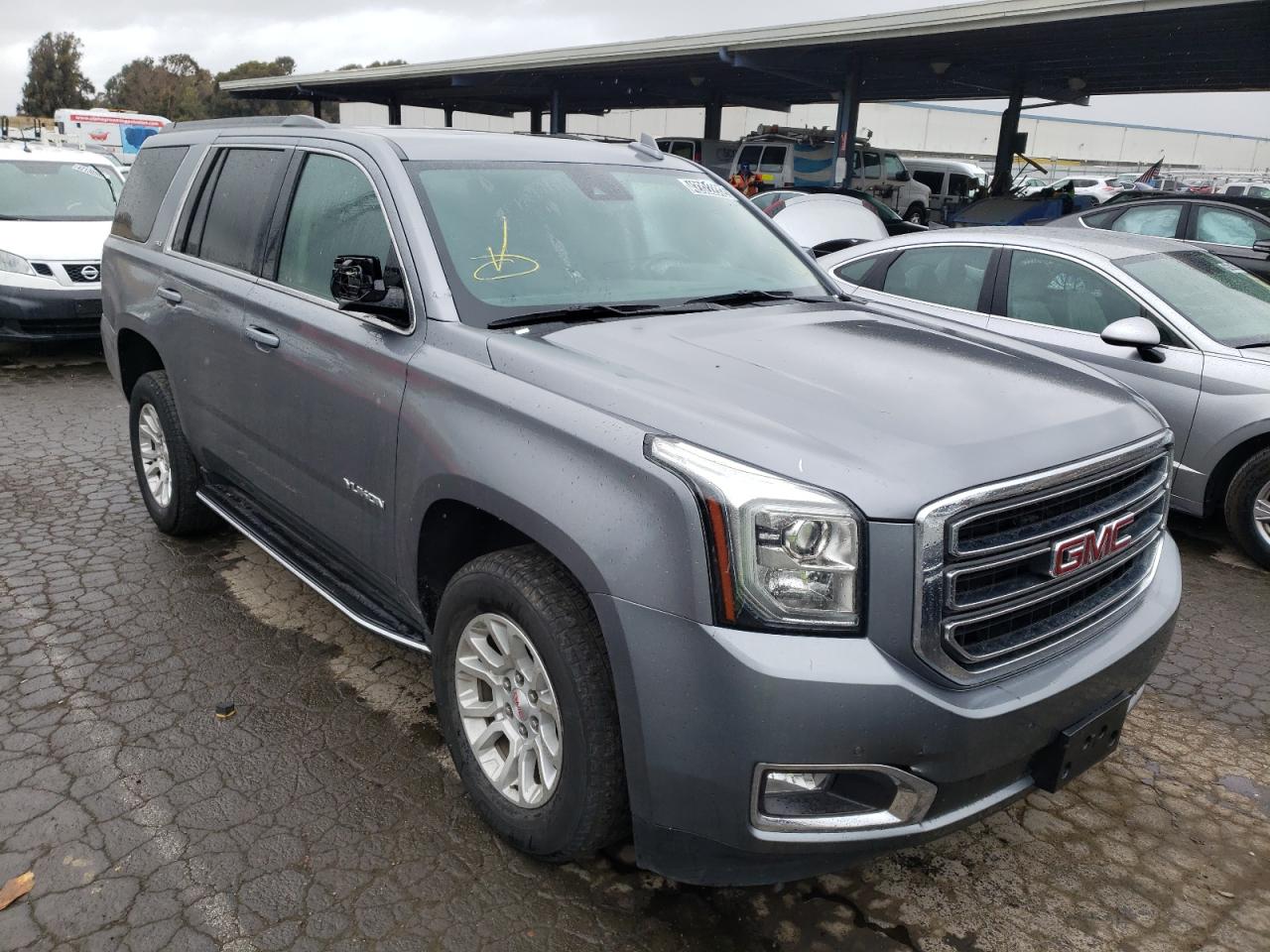 GMC YUKON SLT 2020 with VIN 1GKS2BKC3LR260273 - Photo from auction