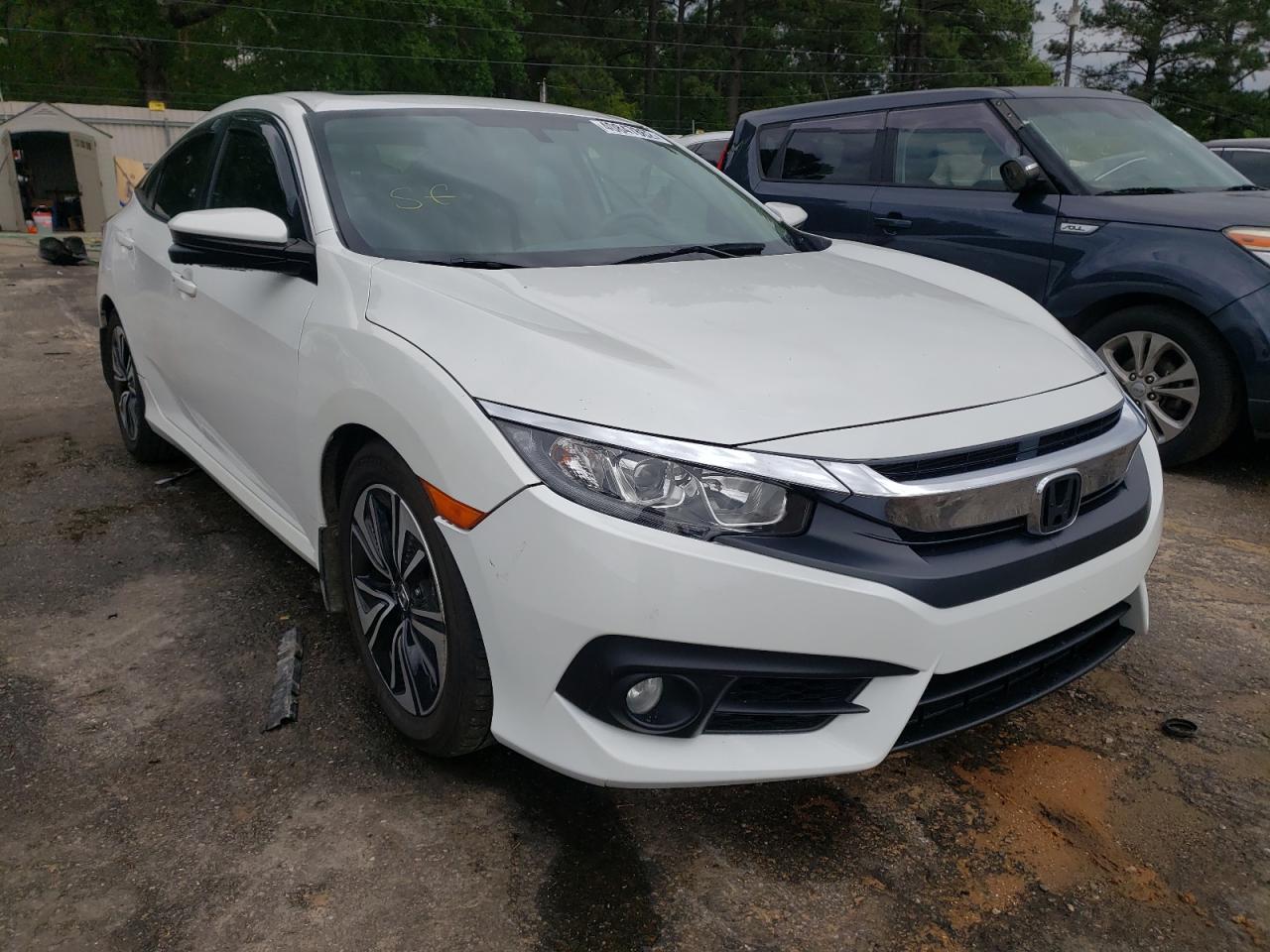 Photo 1 from auction – 2016 HONDA CIVIC EX with VIN 19XFC1F37GE000040