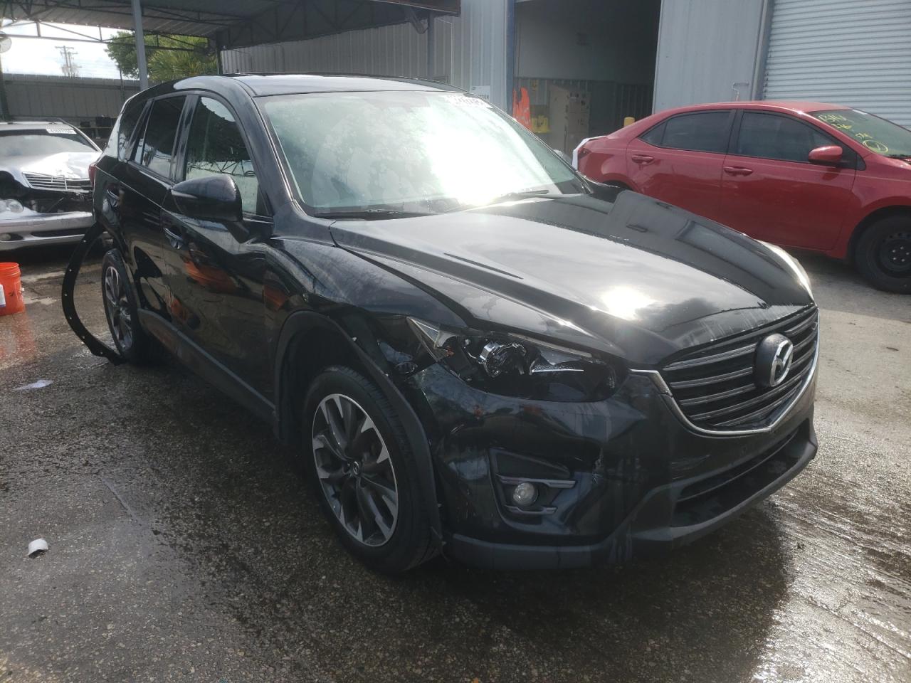 MAZDA CX-5 GT 2016 with VIN JM3KE4DY5G0796473 - Photo from auction