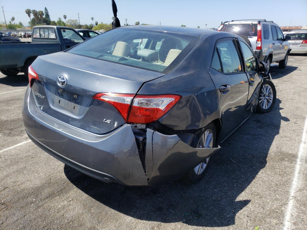 Photo 4 from auction – 2014 TOYOTA COROLLA L with VIN 5YFBURHE0EP090491