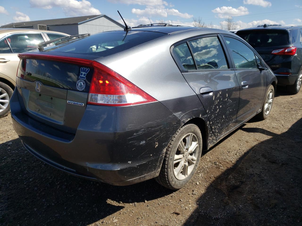 Photo 4 from auction – 2010 HONDA INSIGHT EX with VIN JHMZE2H7XAS021562
