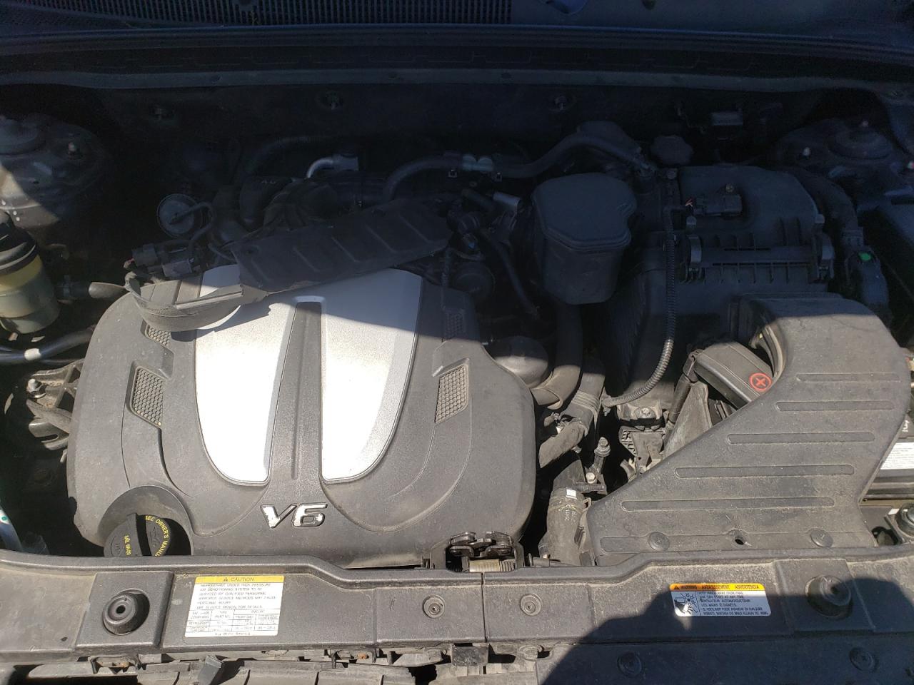Photo 7 from auction – 2012 KIA SORENTO SX with VIN 5XYKWDA24CG228449