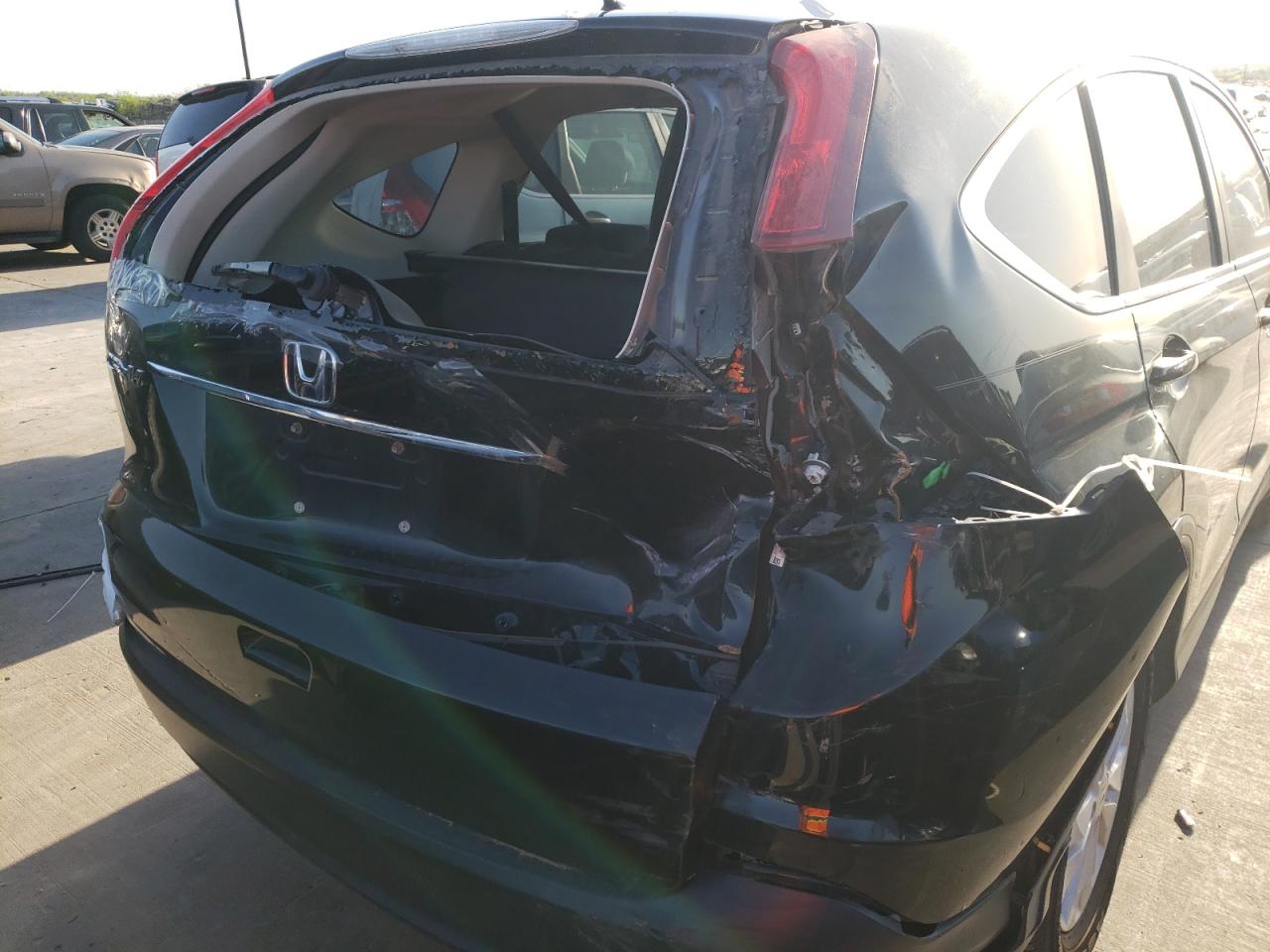 Photo 9 from auction – 2014 HONDA CR-V EX with VIN 2HKRM3H53EH562174