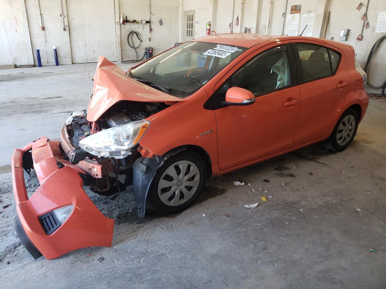 Photo 2 from auction – 2012 TOYOTA PRIUS C with VIN JTDKDTB35C1012570