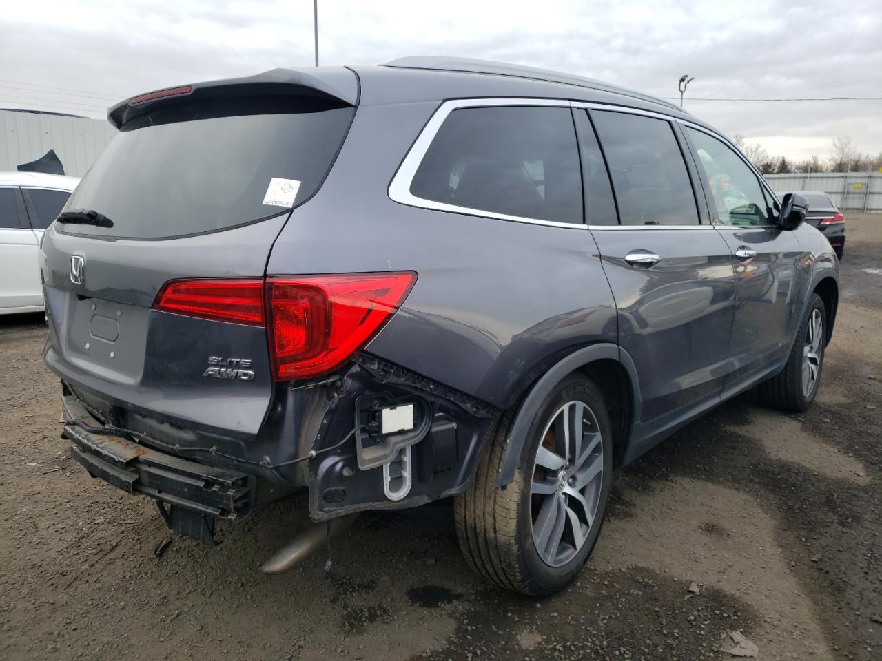 Photo 4 from auction – 2018 HONDA PILOT ELIT with VIN 5FNYF6H03JB002885