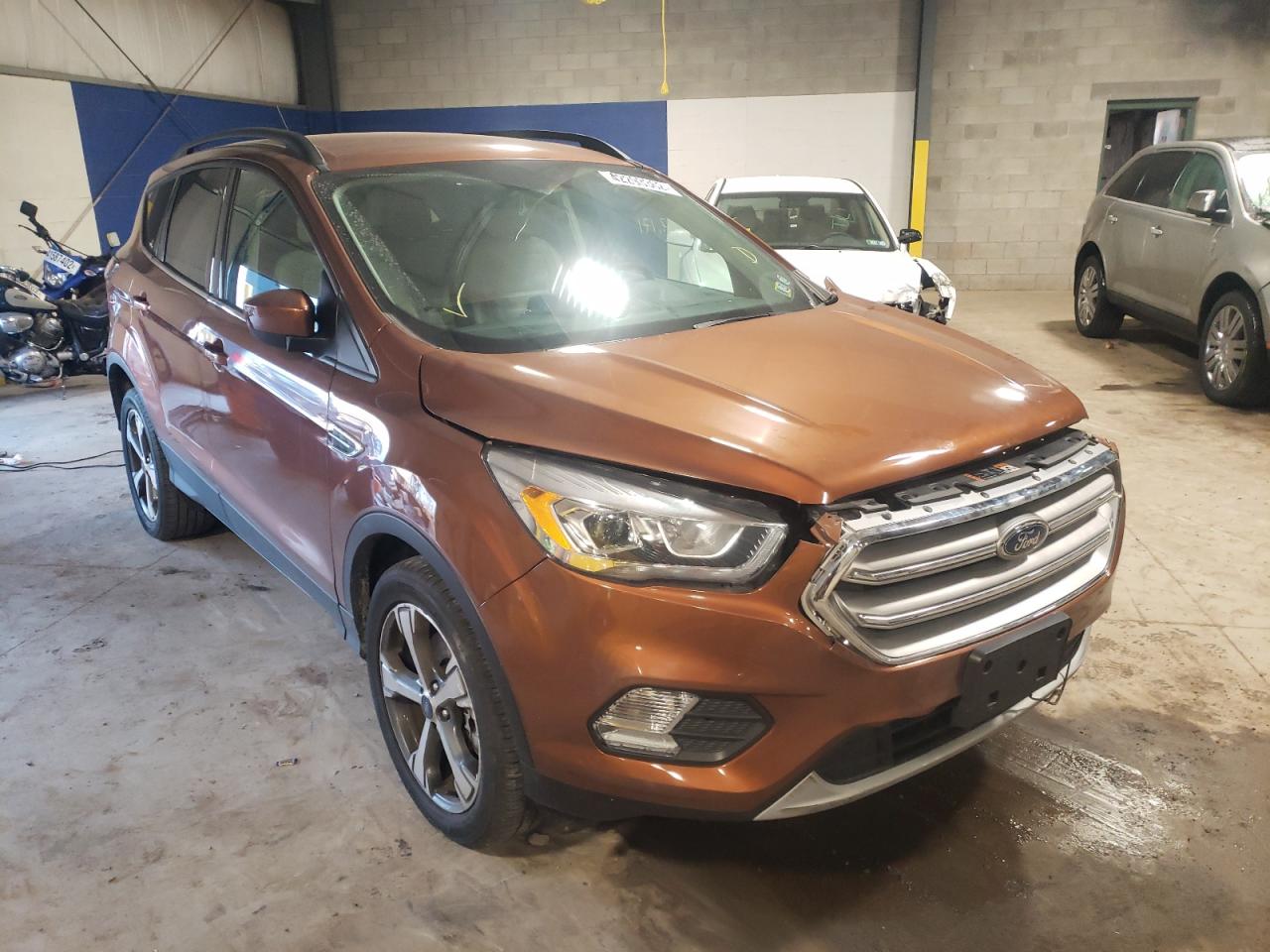 FORD ESCAPE SE 2017 with VIN 1FMCU9GD4HUD33378 - Photo from auction