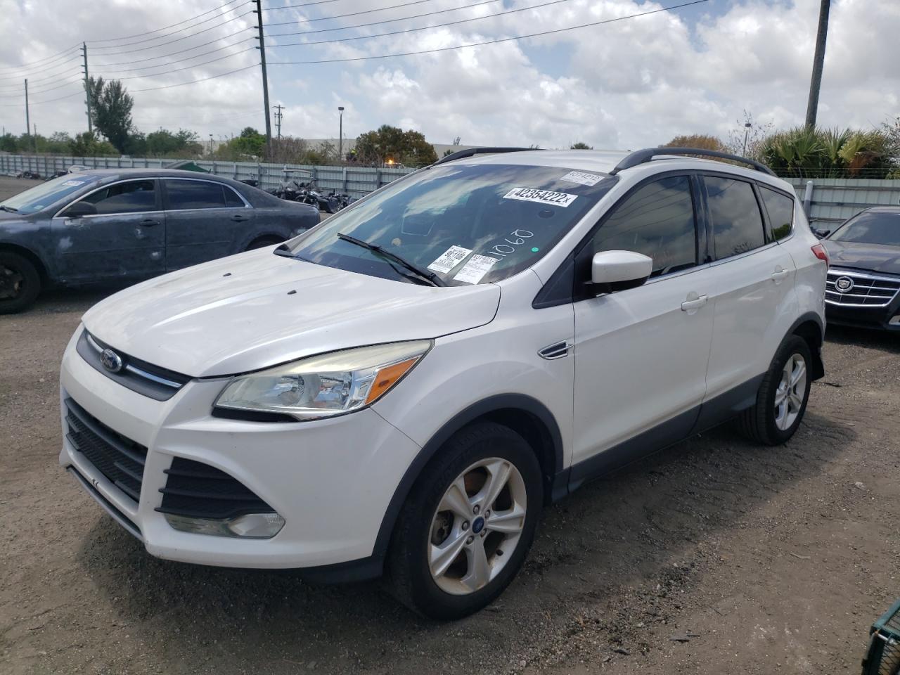 Photo 2 from auction – 2014 FORD ESCAPE SE with VIN 1FMCU0G94EUE21060