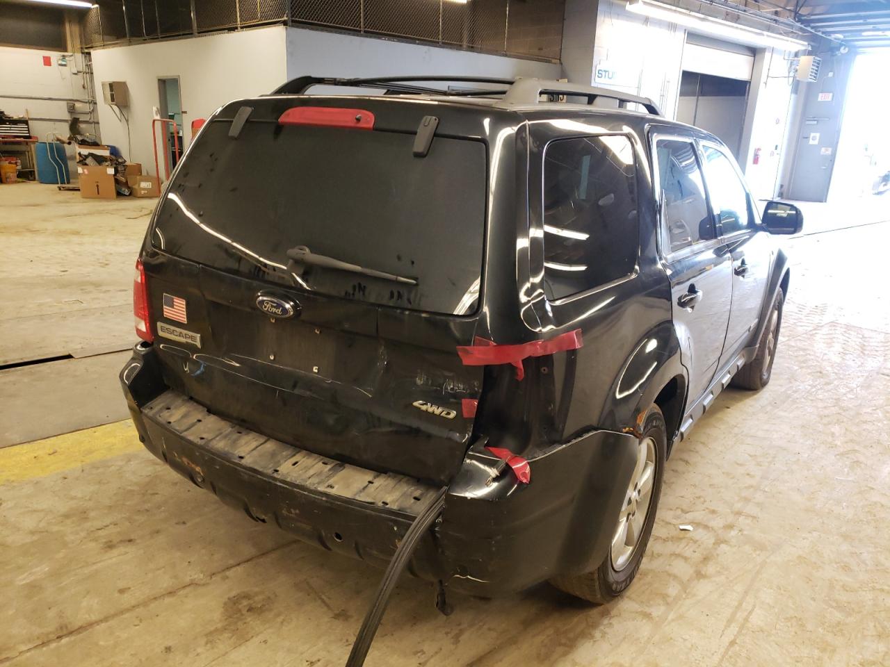 Photo 4 from auction – 2008 FORD ESCAPE LIM with VIN 1FMCU94128KB33055