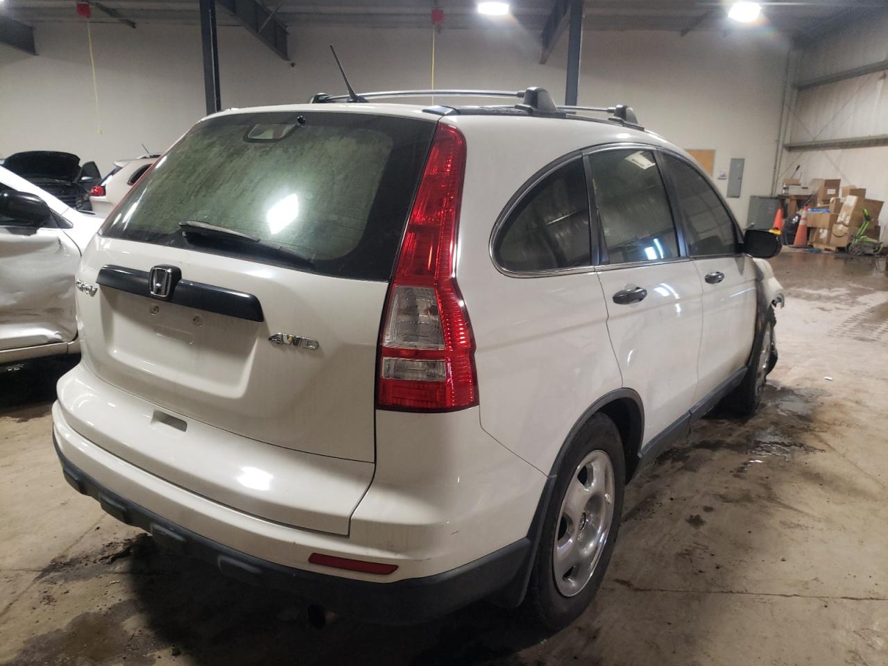 Photo 4 from auction – 2011 HONDA CR-V LX with VIN JHLRE4H36BC020255