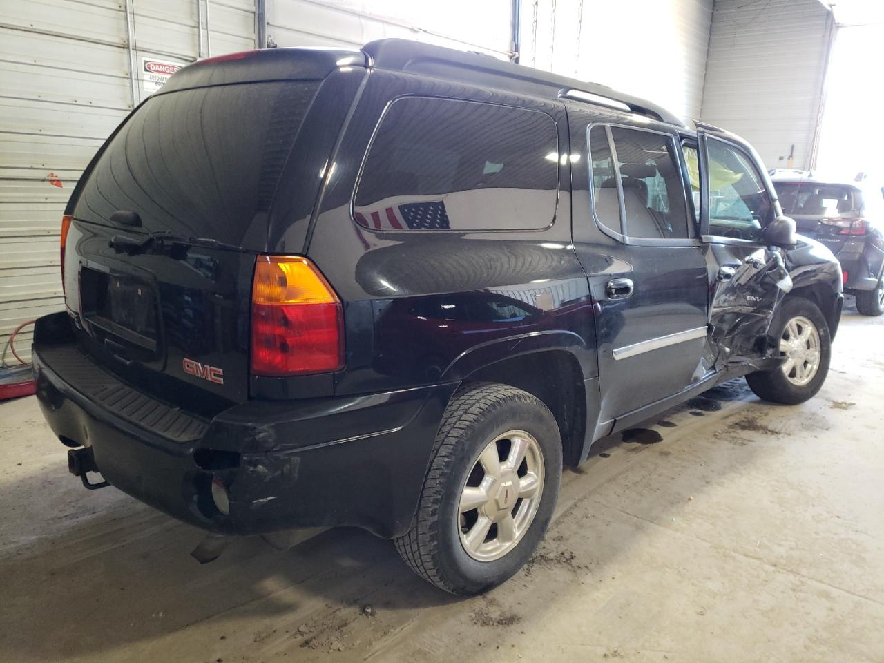 Photo 4 from auction – 2006 GMC ENVOY XL with VIN 1GKET16S166133467