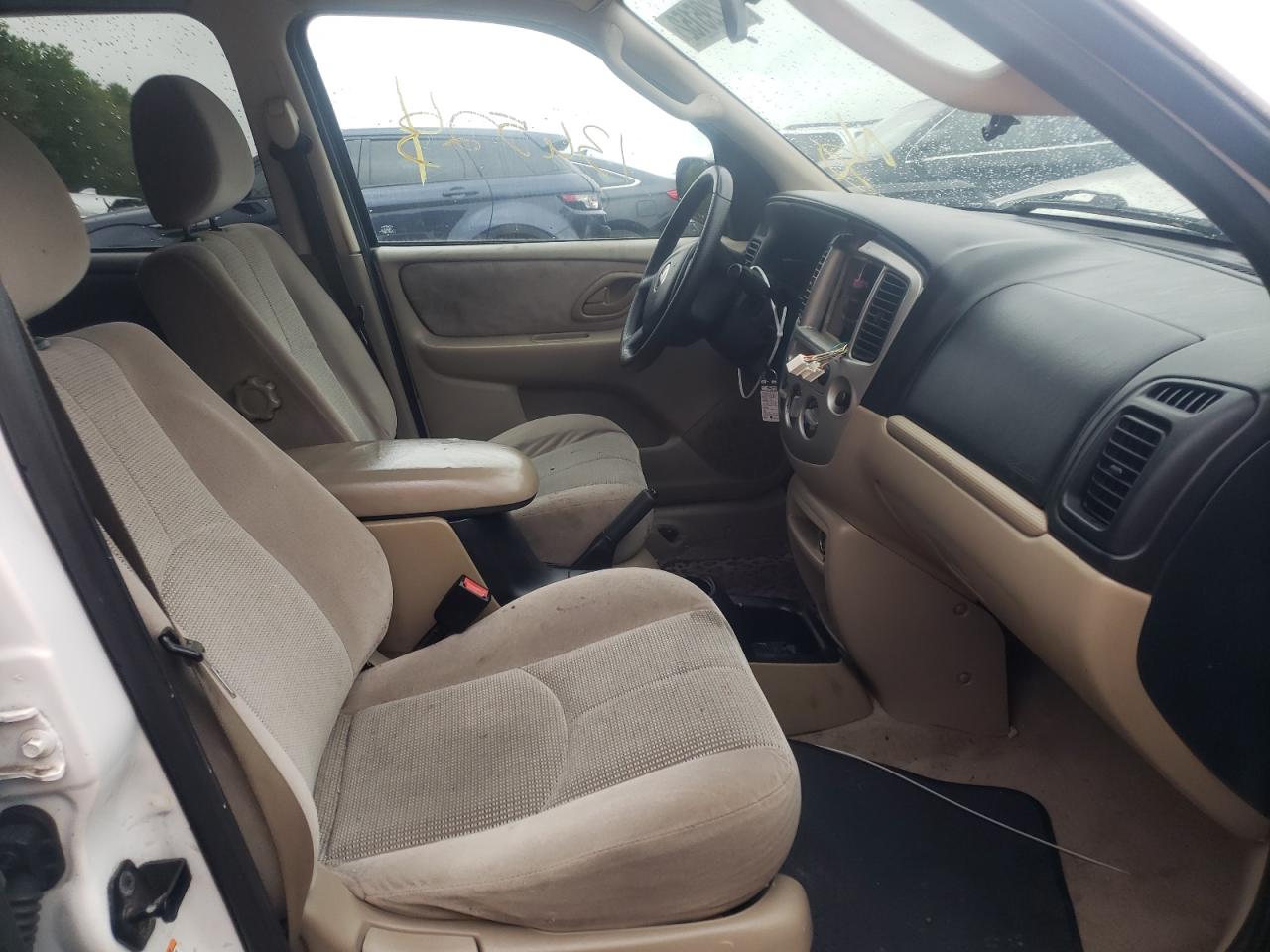 Photo 5 from auction – 2004 MAZDA TRIBUTE LX with VIN 4F2CZ04104KM17859