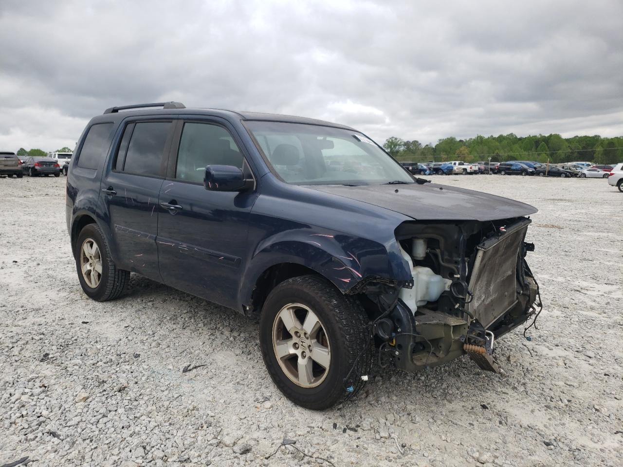 HONDA PILOT EXLN 2011 with VIN 5FNYF3H75BB002271 - Photo from auction