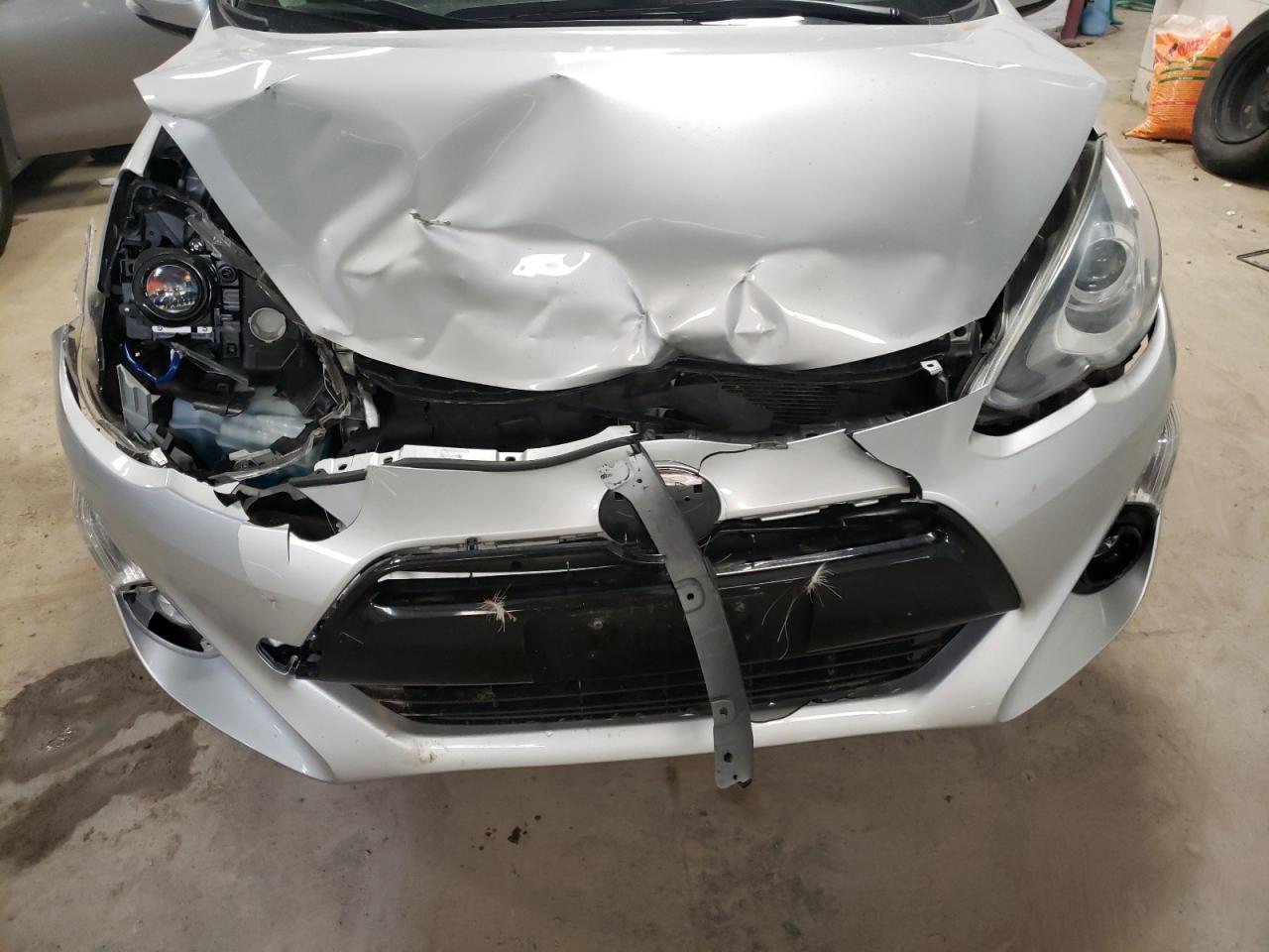 Photo 9 from auction – 2015 TOYOTA PRIUS C with VIN JTDKDTB34F1103429