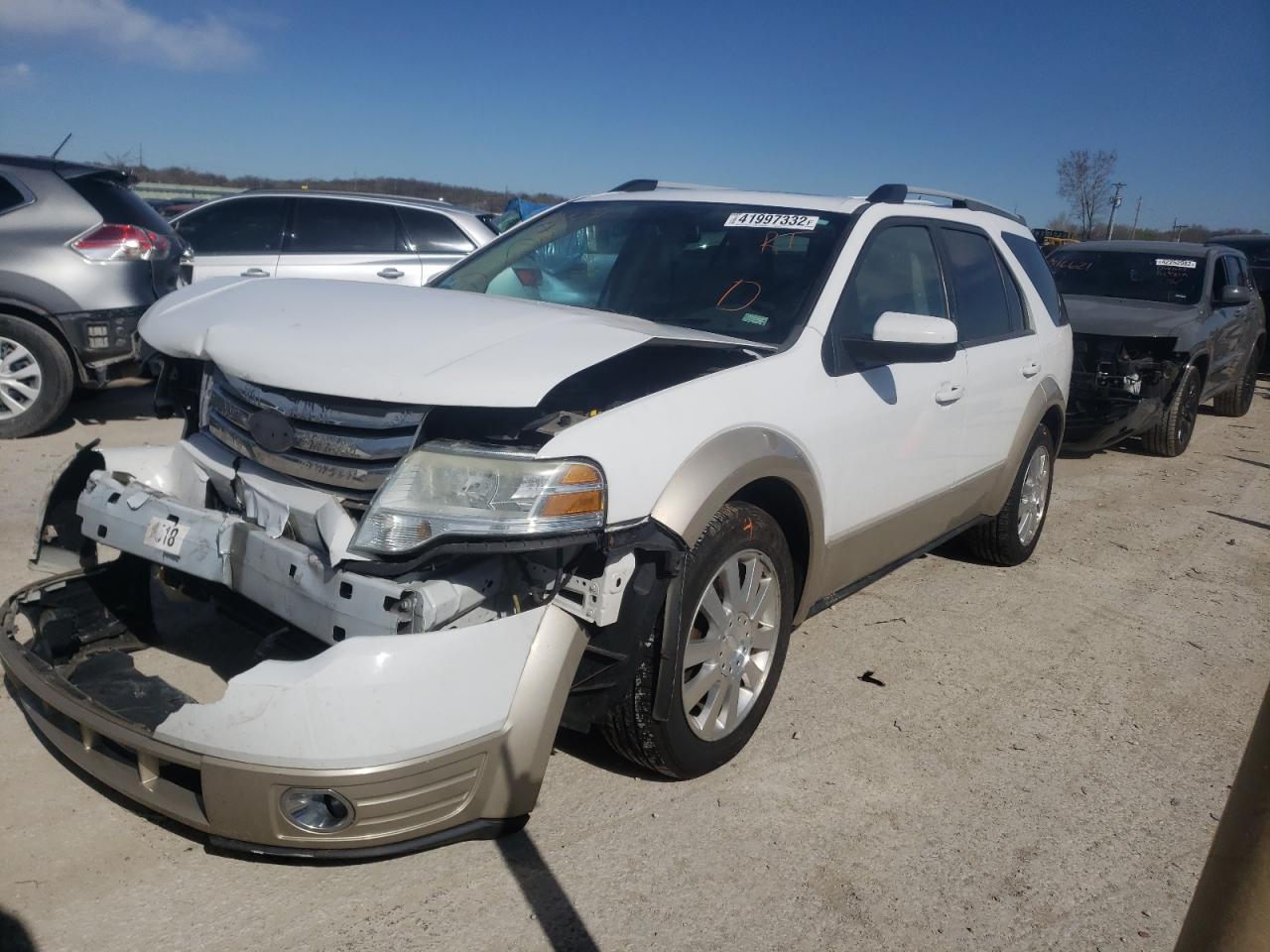 Photo 2 from auction – 2008 FORD TAURUS X E with VIN 1FMDK07W58GA31037