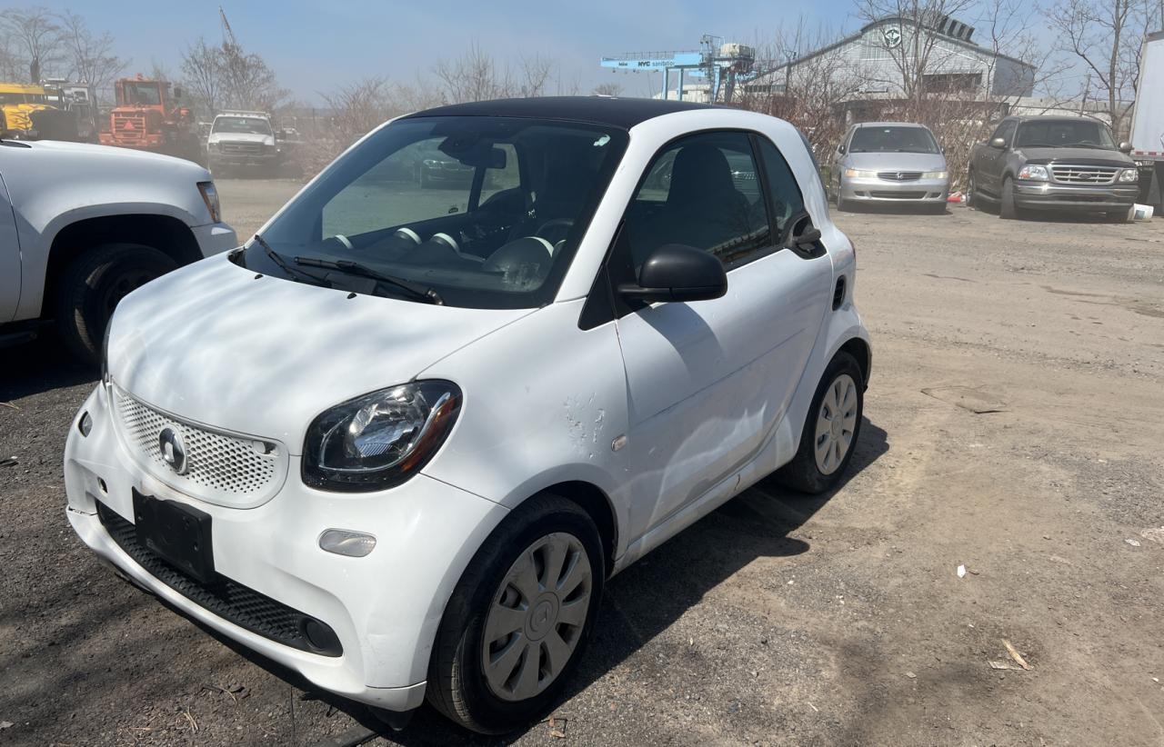 Photo 2 from auction – 2016 SMART FORTWO with VIN WMEFJ5DA4GK104689