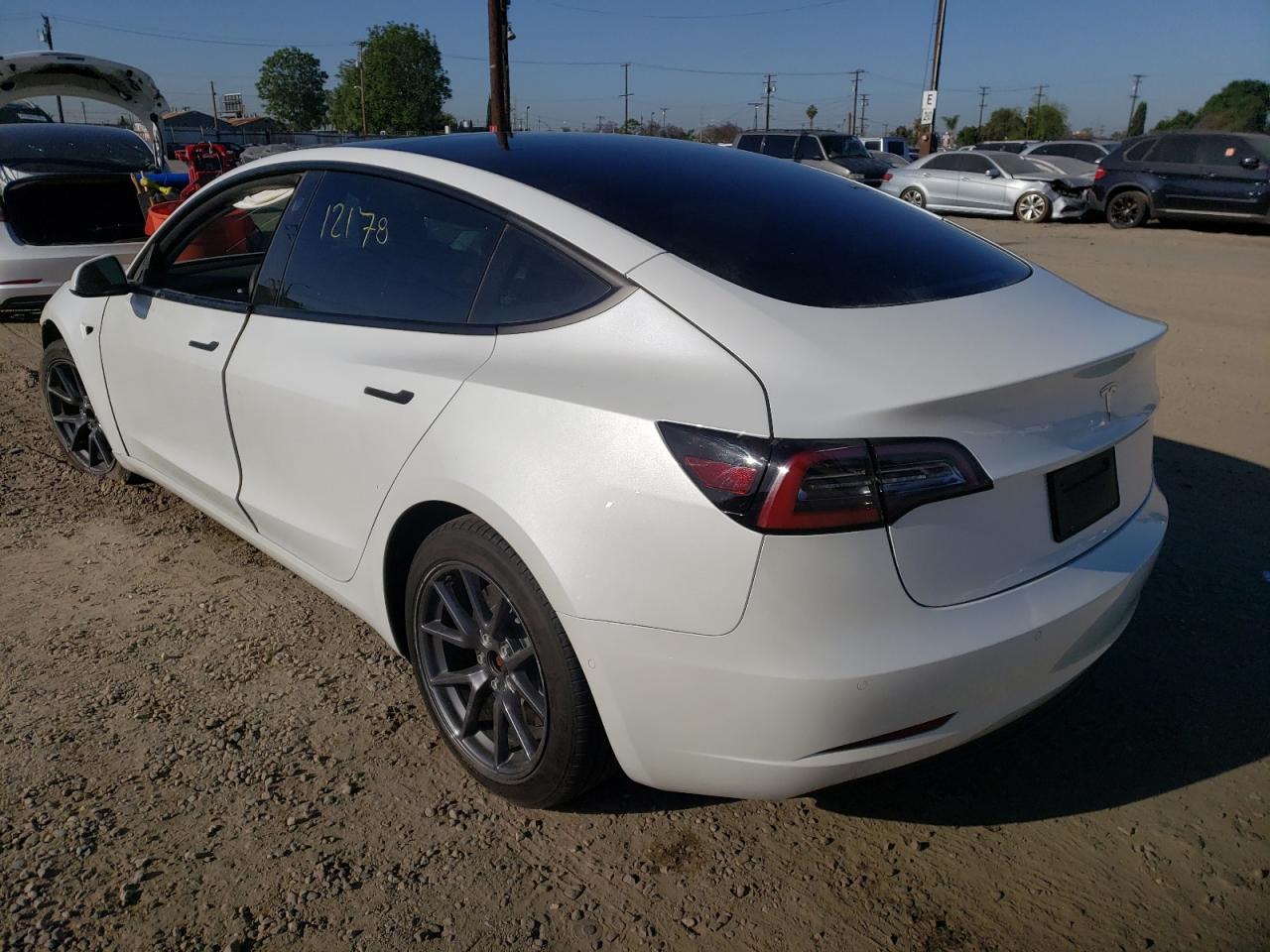 Photo 3 from auction – 2021 TESLA MODEL 3 with VIN 5YJ3E1EA0MF001937