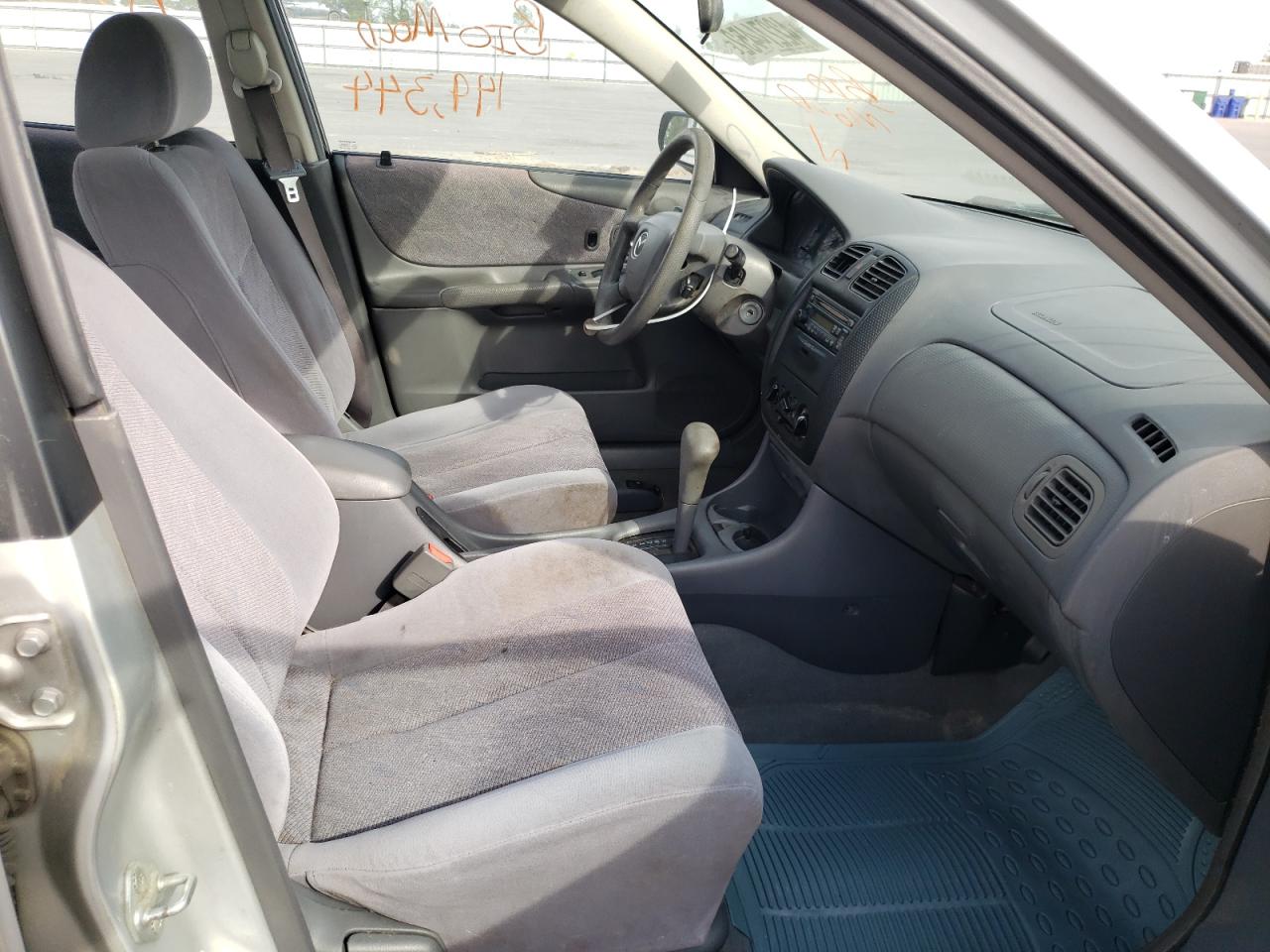 Photo 5 from auction – 2001 MAZDA PROTEGE with VIN JM1BJ2211Y0250057
