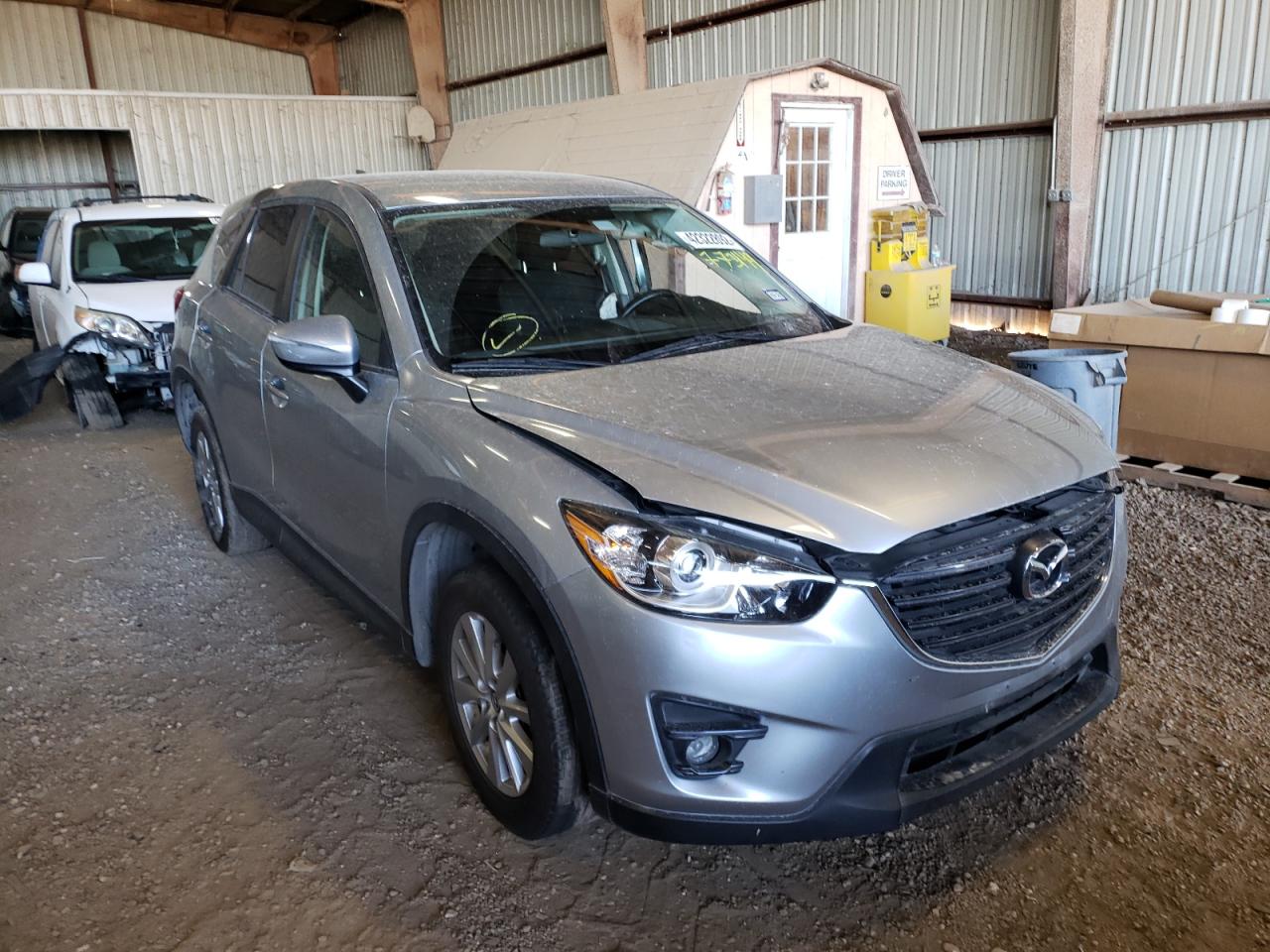 MAZDA CX-5 TOURI 2016 with VIN JM3KE2CY5G0773149 - Photo from auction