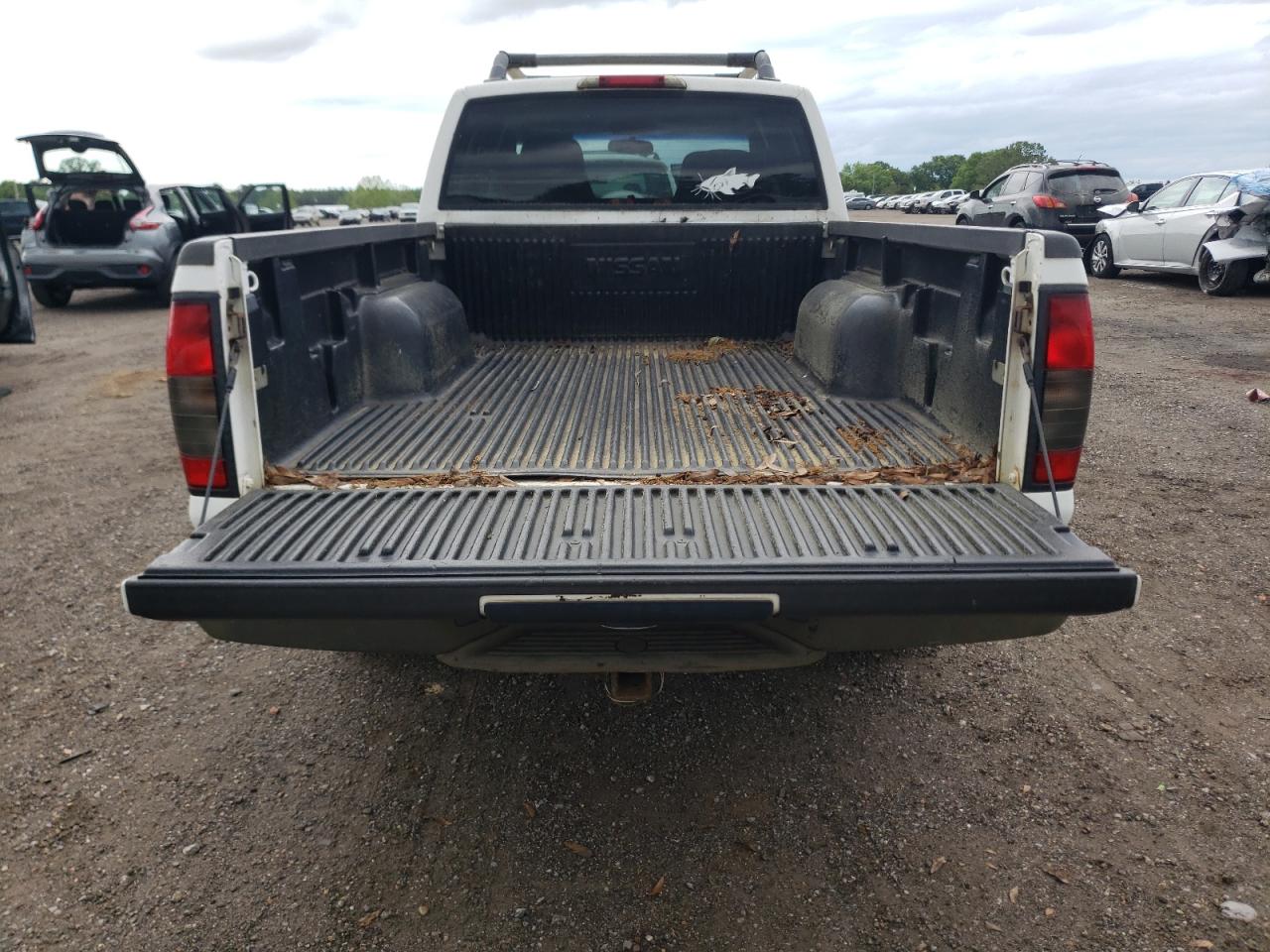 Photo 9 from auction – 2004 NISSAN FRONTIER with VIN 1N6ED29X14C432393