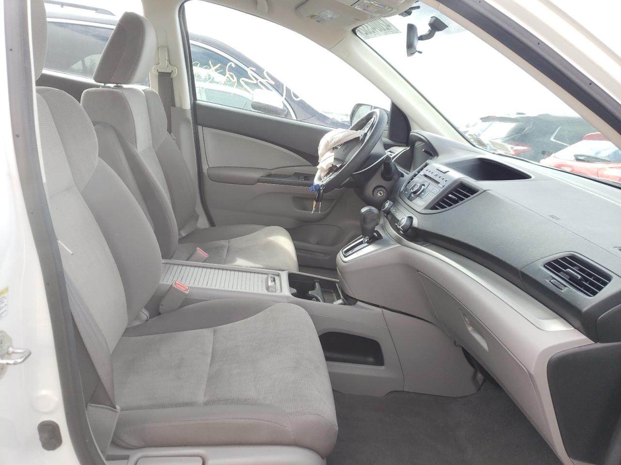 Photo 5 from auction – 2013 HONDA CR-V LX with VIN 5J6RM4H31DL079176