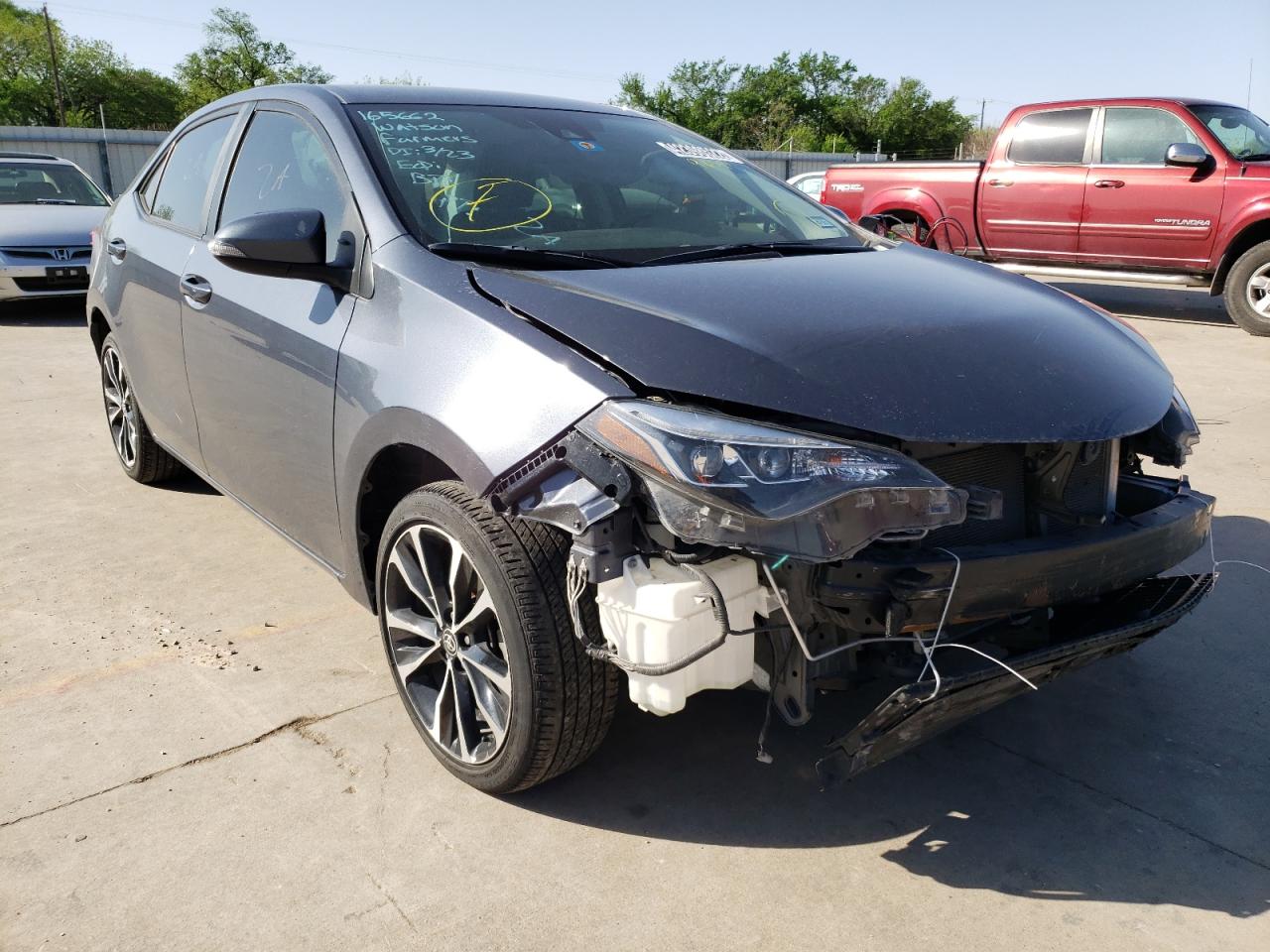 TOYOTA COROLLA L 2019 with VIN 5YFBURHE9KP916394 - Photo from auction