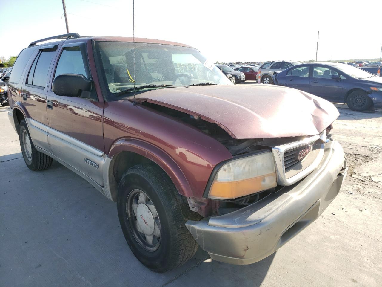 GMC JIMMY 2000 with VIN 1GKCS13W3Y2142344 - Photo from auction