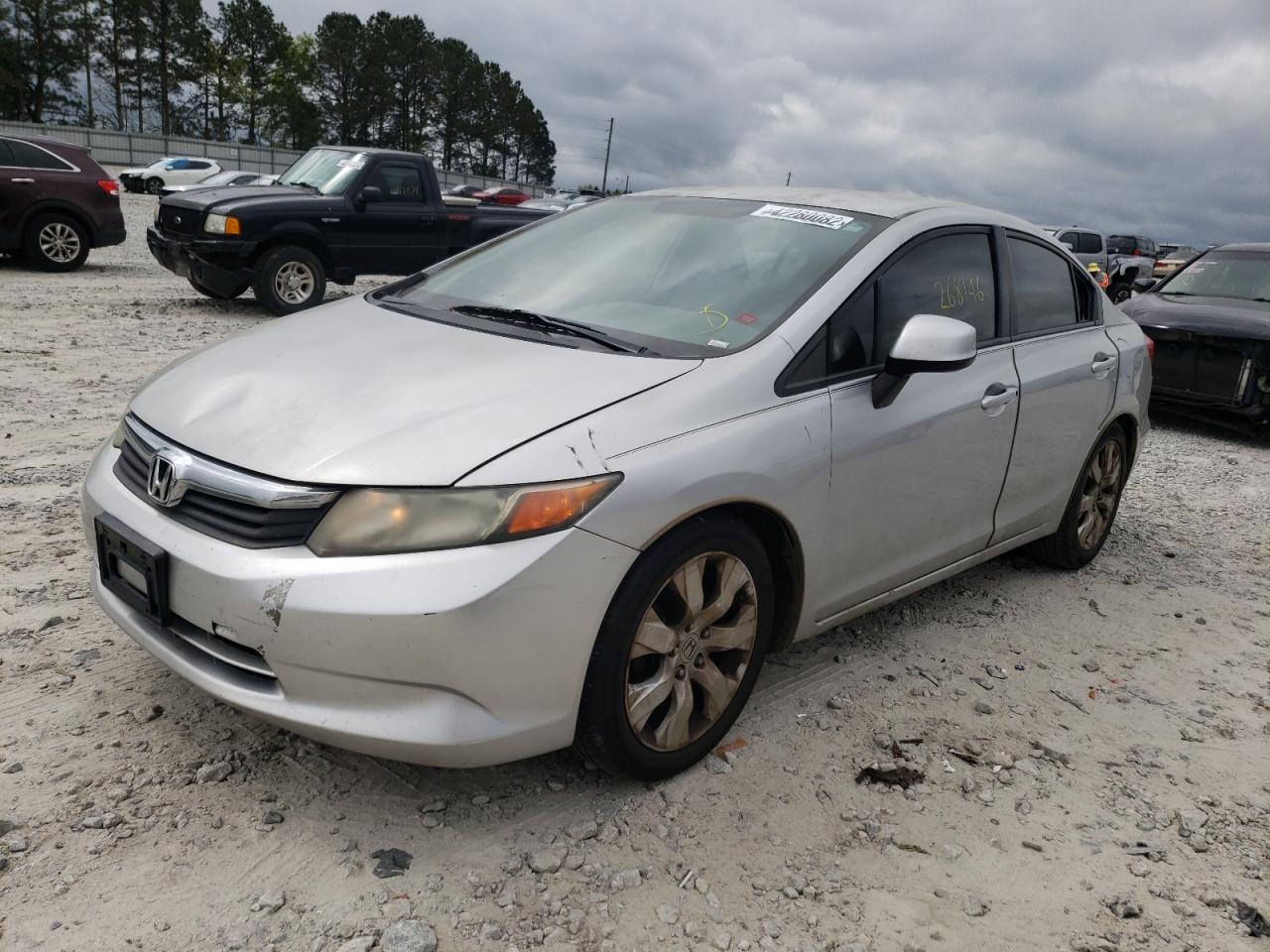 Photo 2 from auction – 2012 HONDA CIVIC LX with VIN 2HGFB2F58CH336046