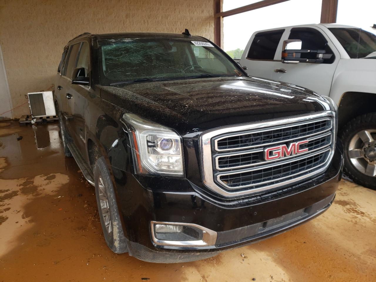 GMC YUKON SLE 2015 with VIN 1GKS2AKC6FR715468 - Photo from auction