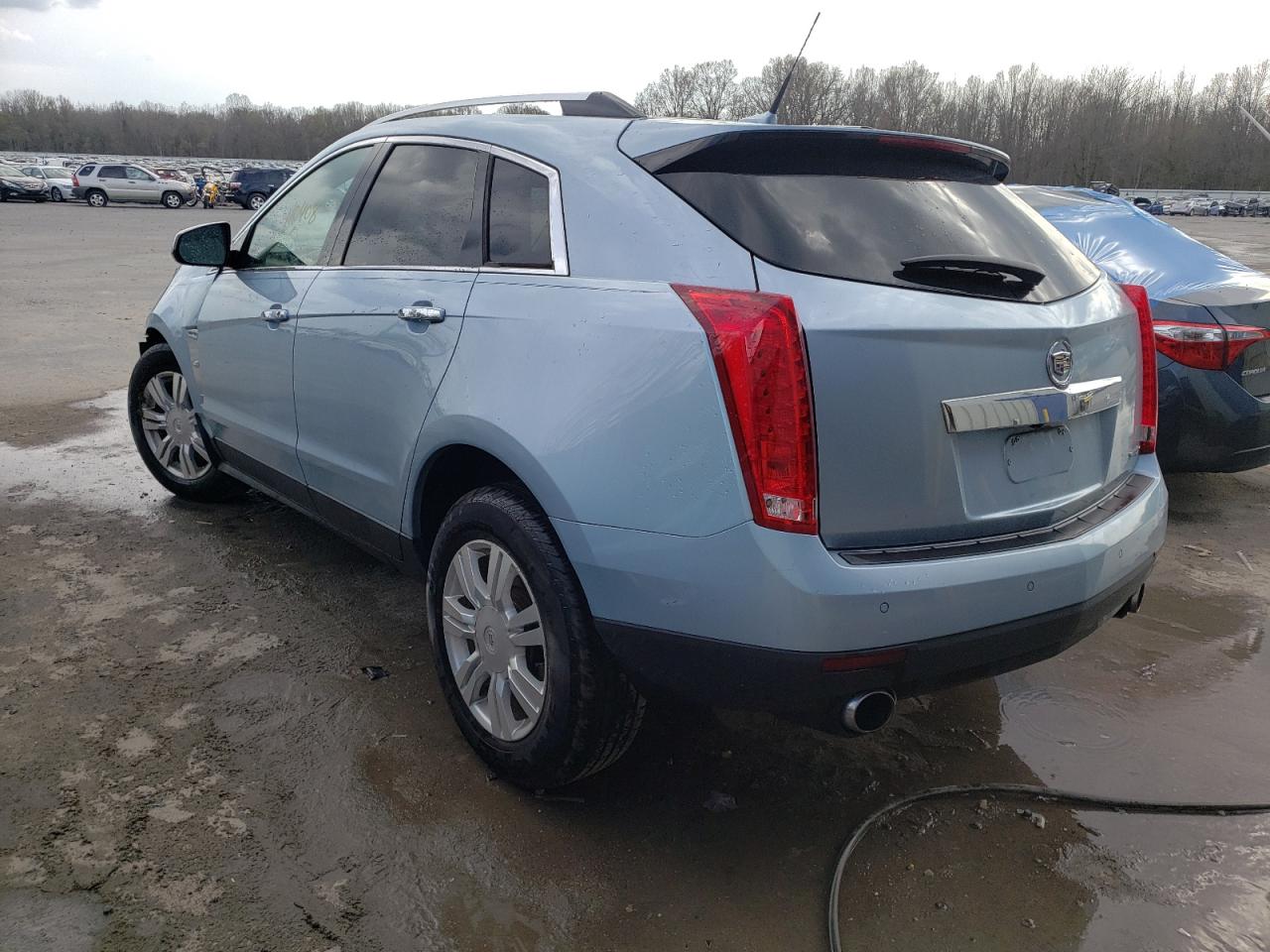 Photo 3 from auction – 2011 CADILLAC SRX LUXURY with VIN 3GYFNAEY4BS648432