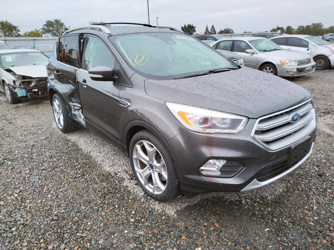 FORD ESCAPE TIT 2017 with VIN 1FMCU0J96HUD29347 - Photo from auction
