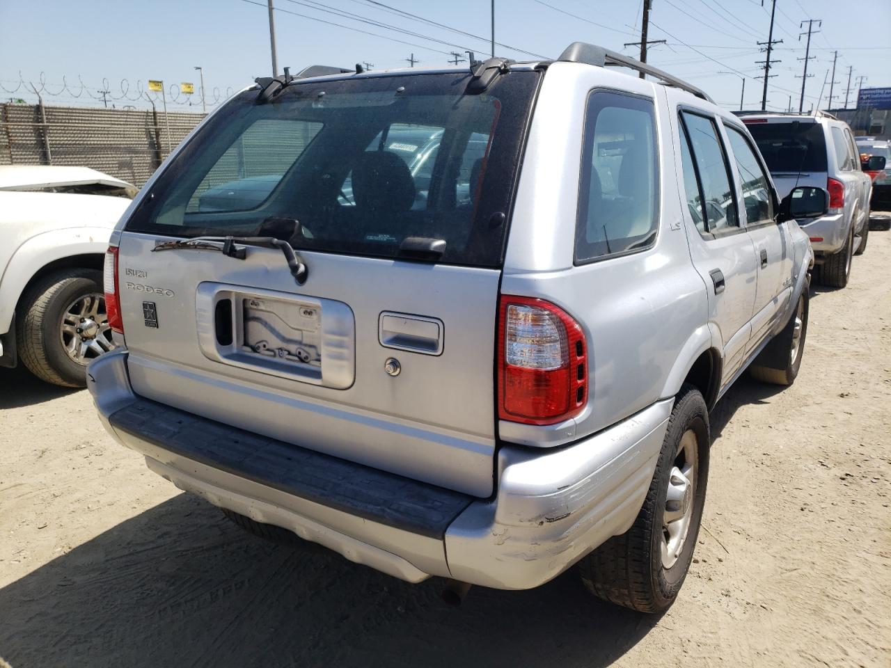 Photo 4 from auction – 2000 ISUZU RODEO S with VIN 4S2CK58W3Y4347702