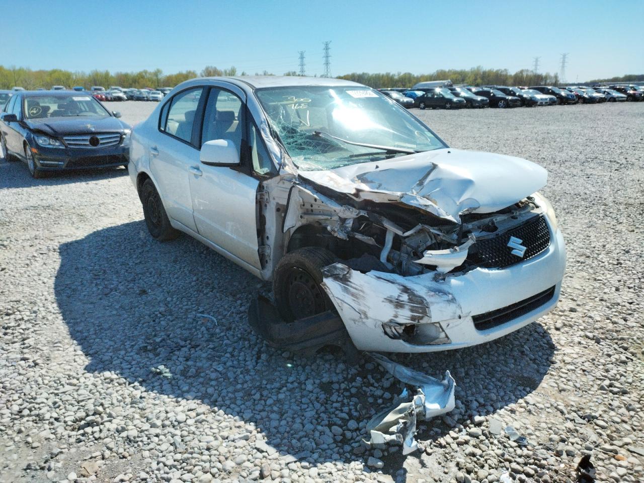 SUZUKI SX4 LE 2011 with VIN JS2YC5A24B6301657 - Photo from auction