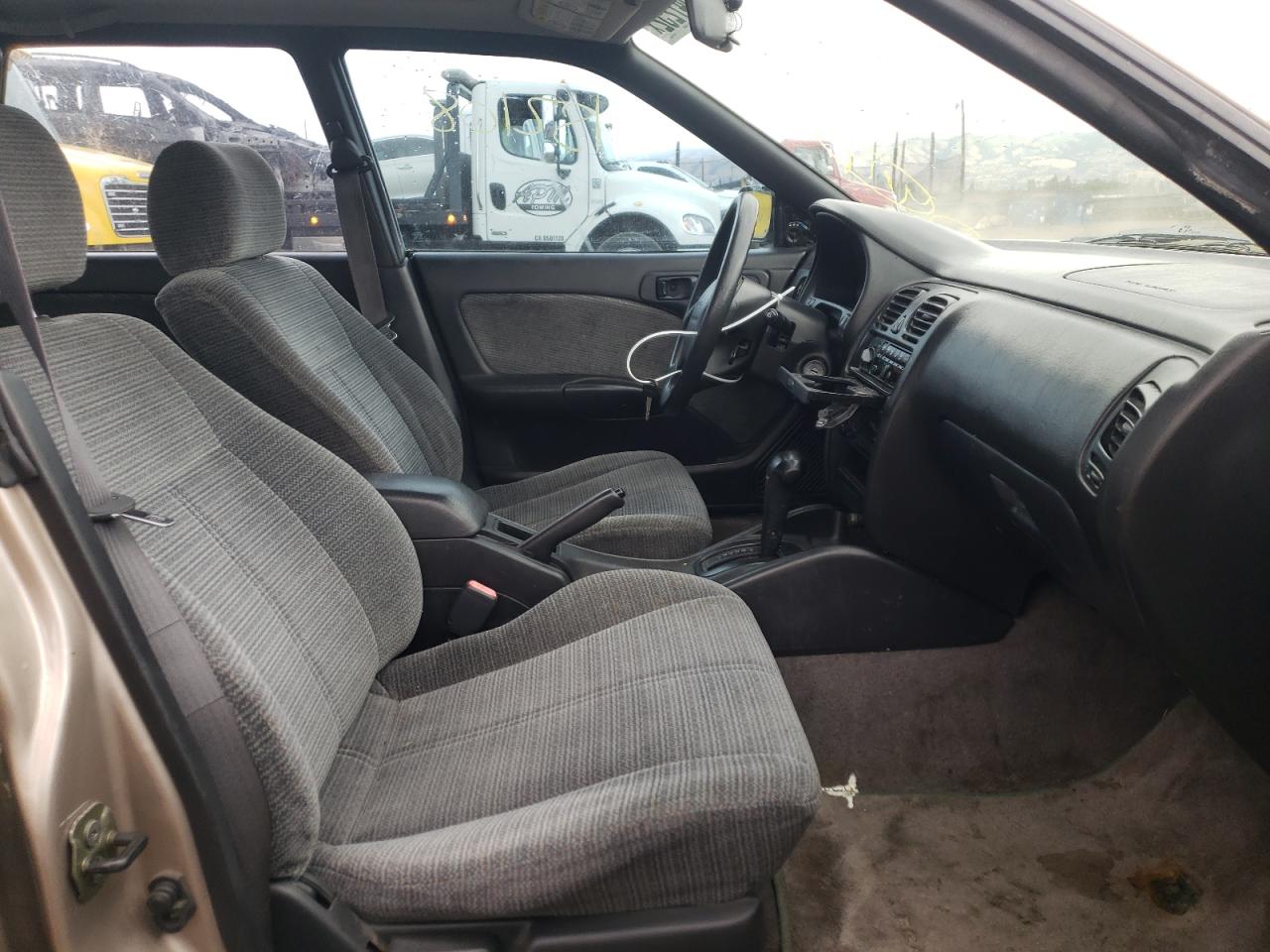 Photo 5 from auction – 1999 SUBARU LEGACY with VIN 4S3BK435XX7301765