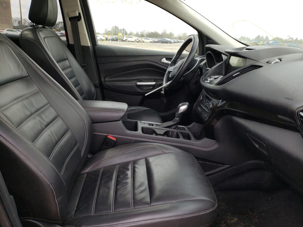 Photo 5 from auction – 2018 FORD ESCAPE TIT with VIN 1FMCU9J96JUA14607