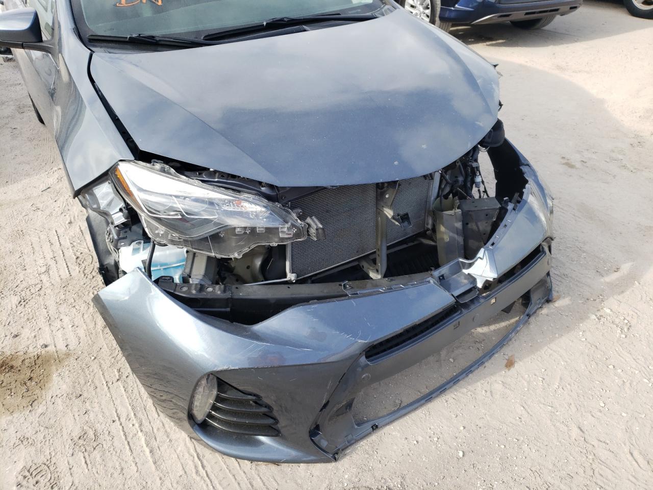 Photo 9 from auction – 2018 TOYOTA COROLLA L with VIN 5YFBURHE9JP818612