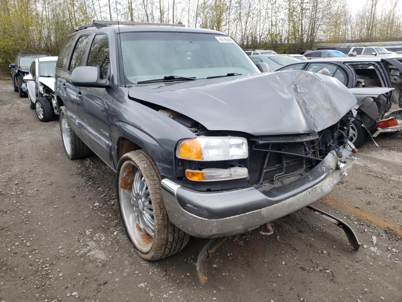 Photo 1 from auction – 2001 GMC YUKON with VIN 1GKEK13T11J142319