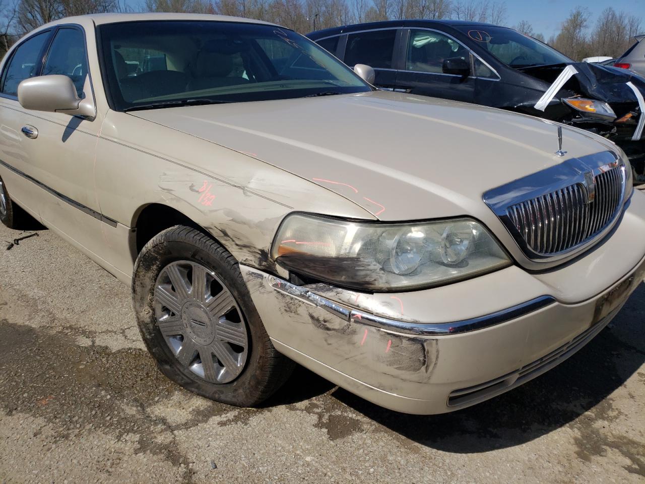 Photo 9 from auction – 2003 LINCOLN TOWN CAR C with VIN 1LNHM83W93Y628274