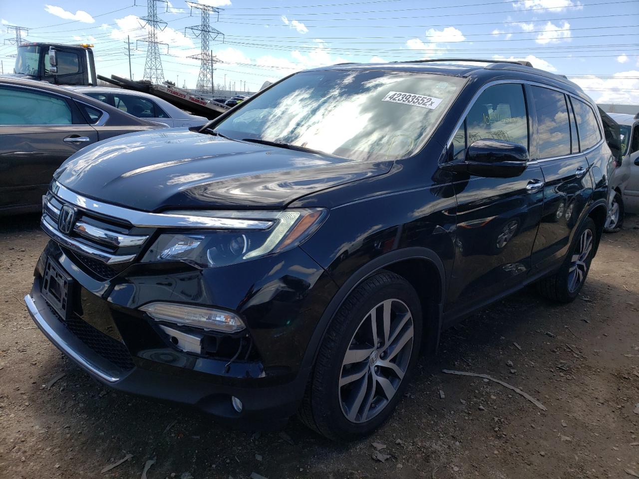 Photo 2 from auction – 2016 HONDA PILOT ELIT with VIN 5FNYF6H07GB114131