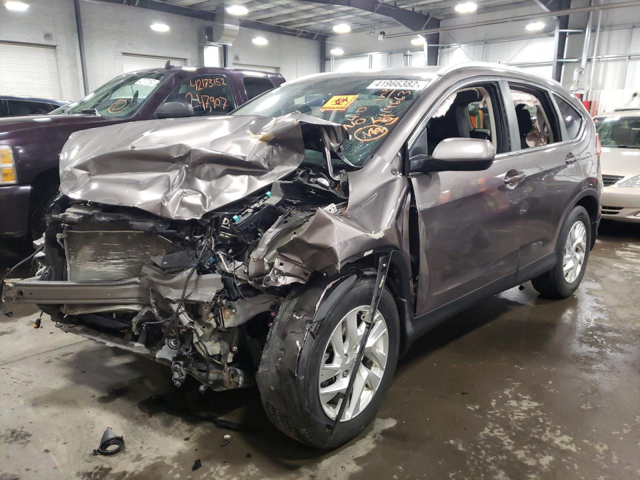 Photo 2 from auction – 2015 HONDA CR-V EXL with VIN 5J6RM4H72FL002757