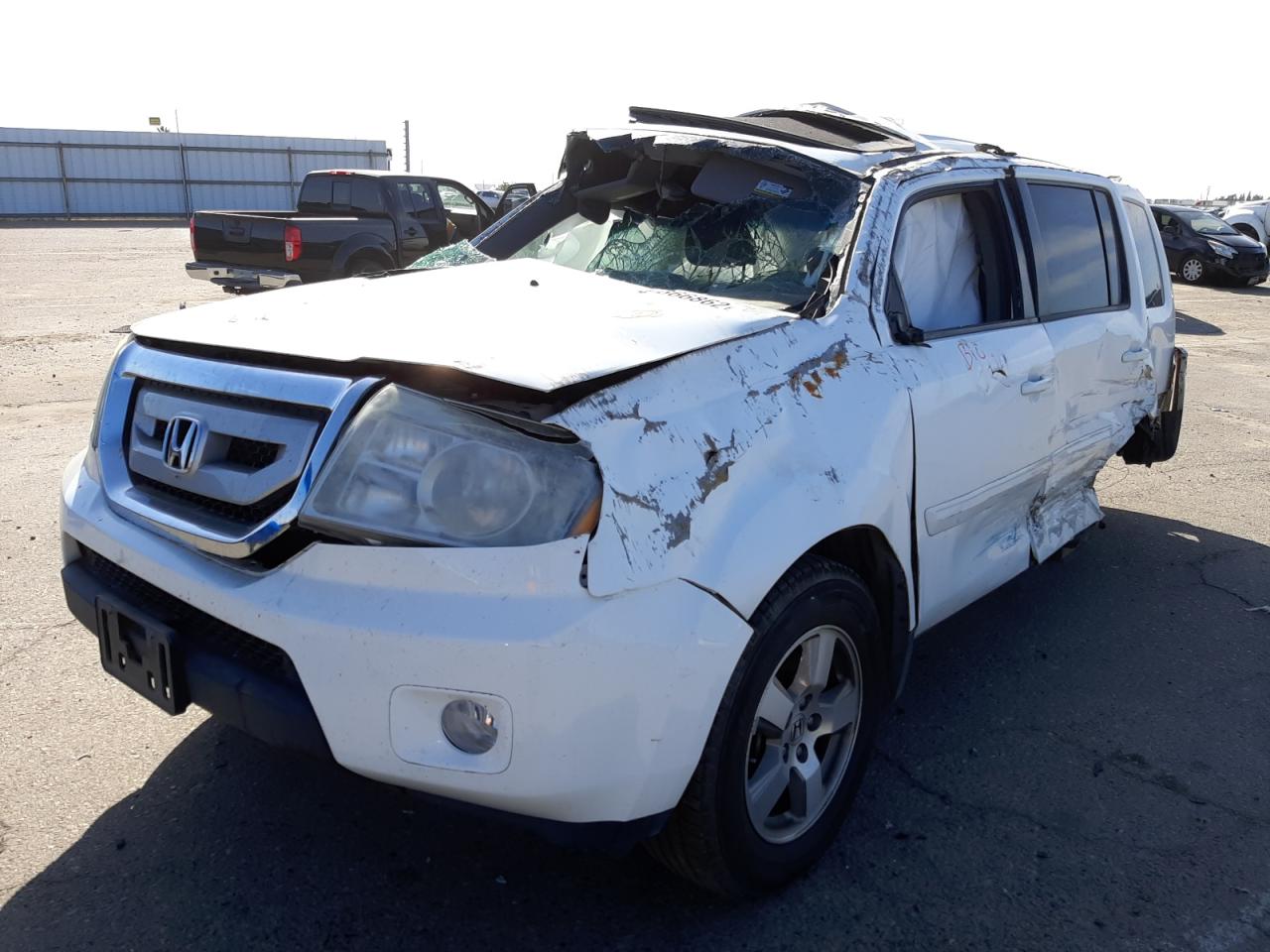 Photo 2 from auction – 2011 HONDA PILOT EXLN with VIN 5FNYF3H79BB055507