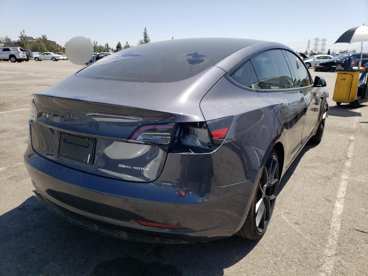 Photo 4 from auction – 2021 TESLA MODEL 3 with VIN 5YJ3E1EB0MF054677