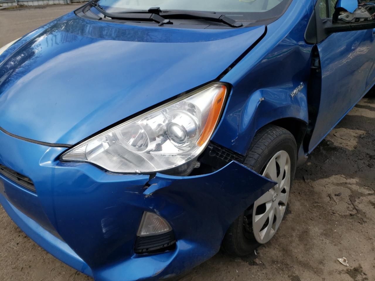 Photo 9 from auction – 2014 TOYOTA PRIUS C with VIN JTDKDTB31E1565249