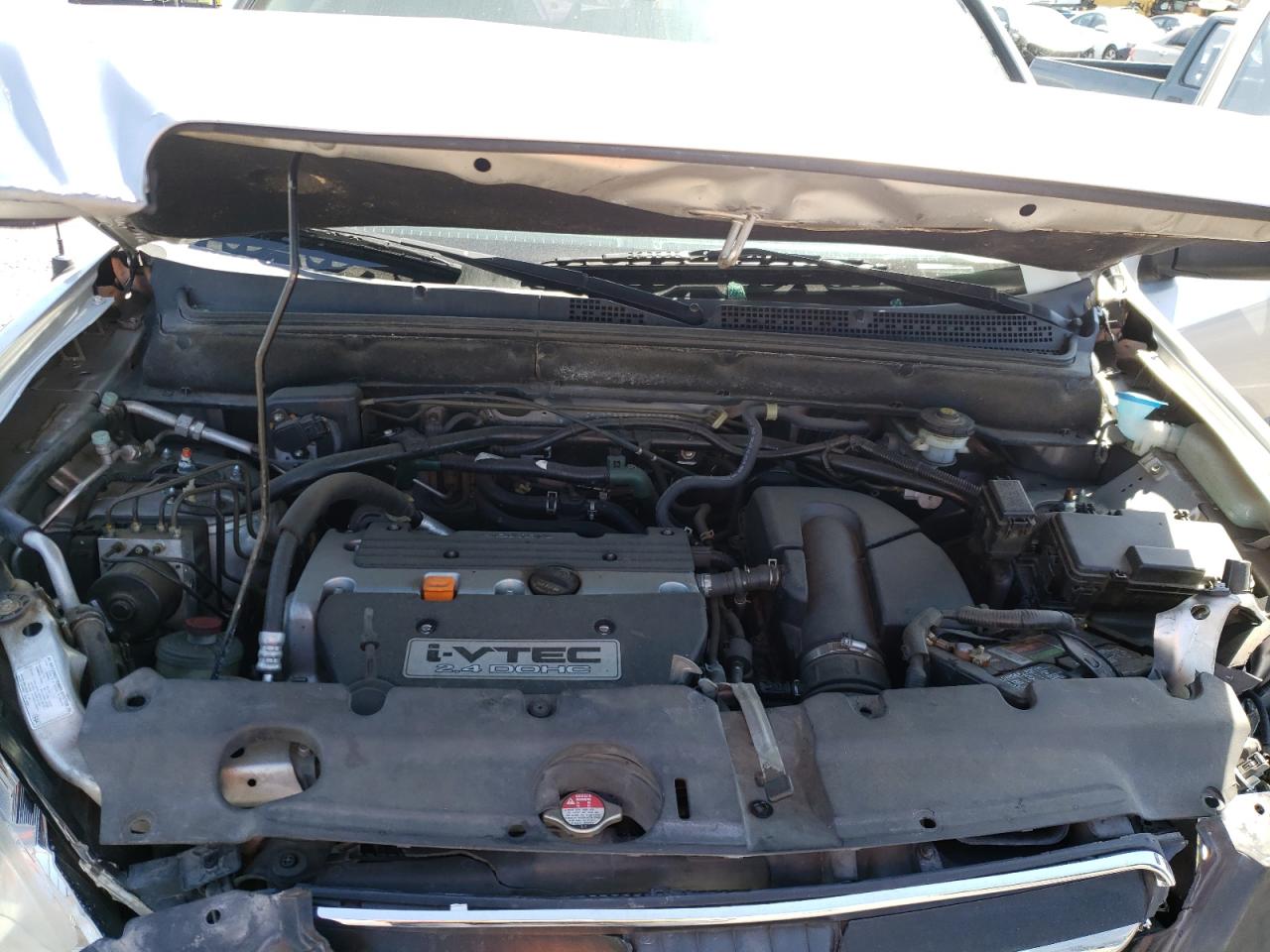 Photo 7 from auction – 2006 HONDA CR-V LX with VIN JHLRD68516C012053