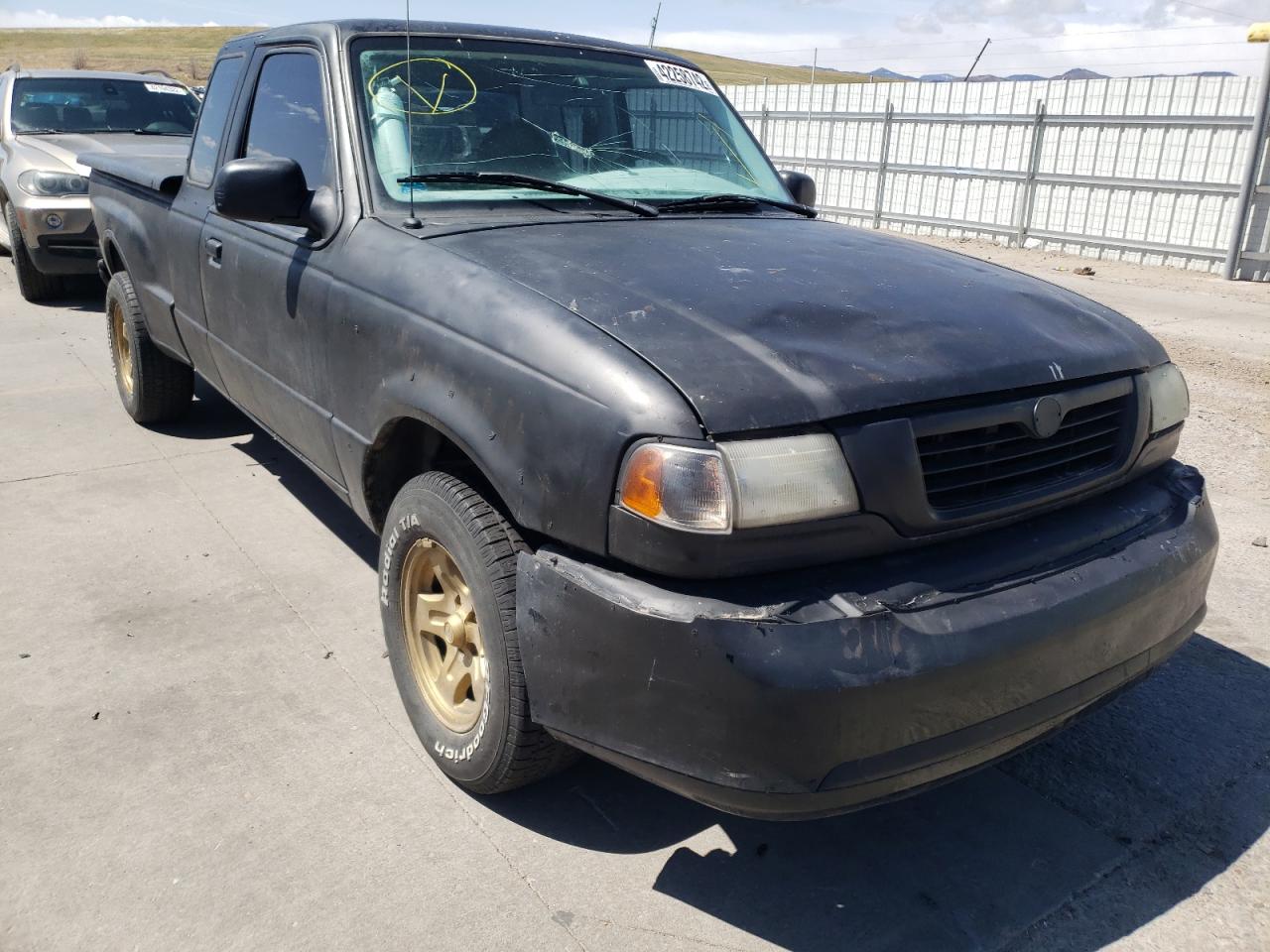 MAZDA B2500 CAB 1999 with VIN 4F4YR16C0XTM35181 - Photo from auction