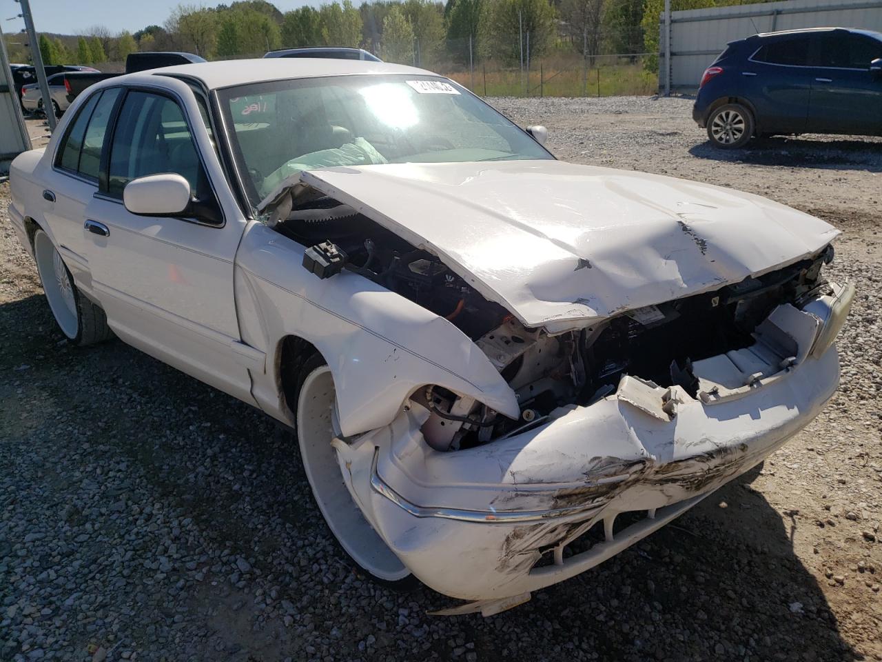 FORD CROWN VICT 1999 with VIN 2FAFP74W1XX111106 - Photo from auction