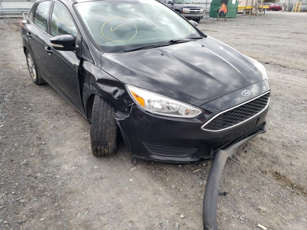 Photo 9 from auction – 2017 FORD FOCUS SE with VIN 1FADP3F24HL234214