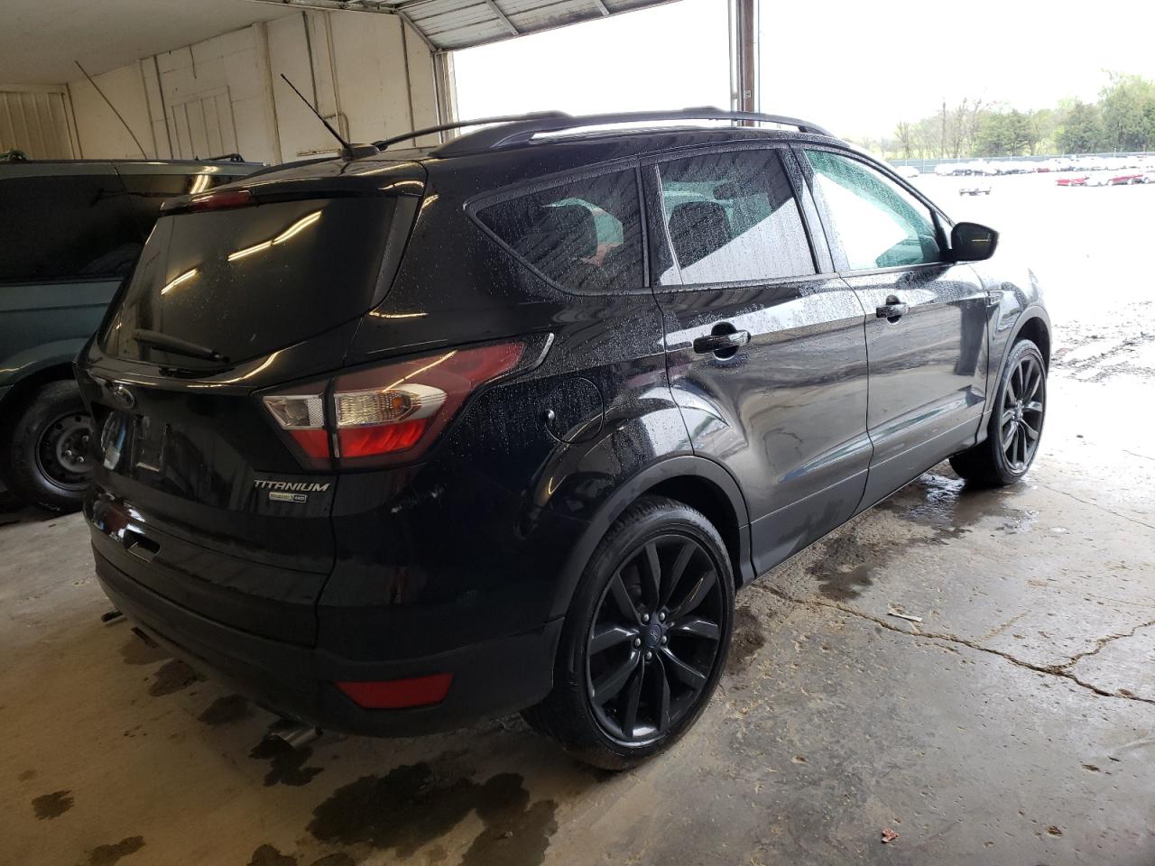 Photo 4 from auction – 2017 FORD ESCAPE TIT with VIN 1FMCU9JD2HUD03241